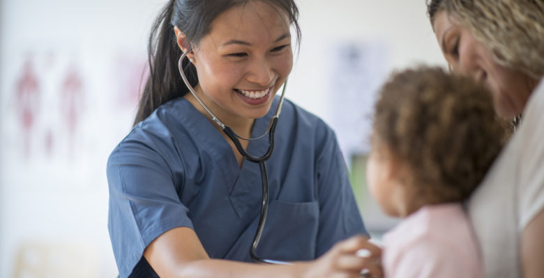 Little Girl at a Check Up with Her Mother