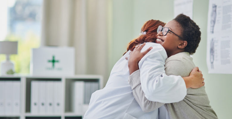 doctor hugging a patient