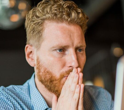 man looking at computer