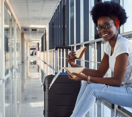 woman eating in airport