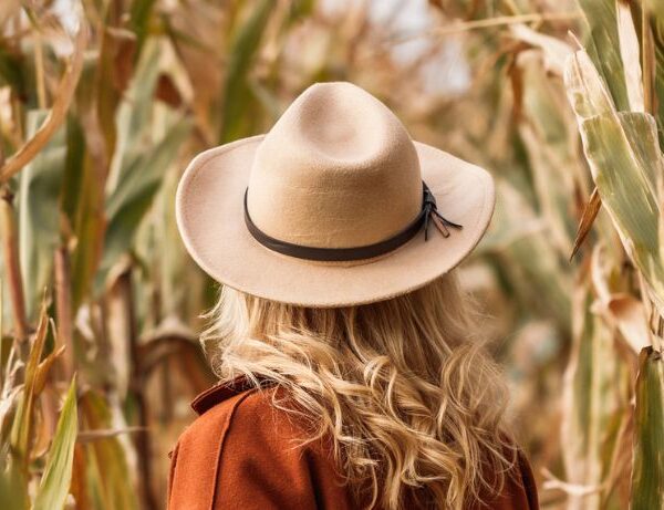 woman walking in corn maze